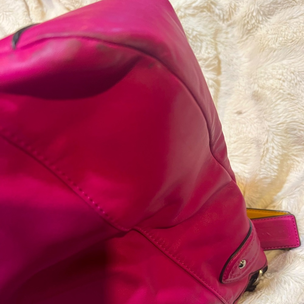 Rare hot pink coach bag can be warn as a shoulder bag or cross body bag